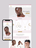 Shopify eCommerce website for jewelry with a phone displaying the site on a light gray background
